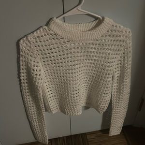 I am selling this white knitted sweater with holes form ARDENE